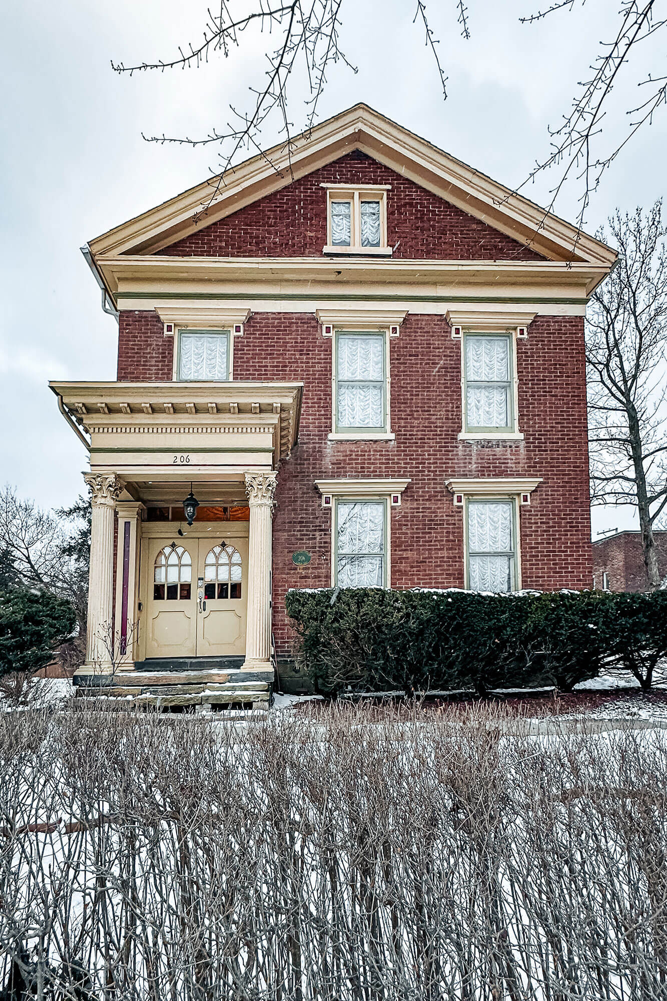 Snow-covered facade of the themed getaway destination in Ohio, perfect for romantic adventures and cozy retreats.